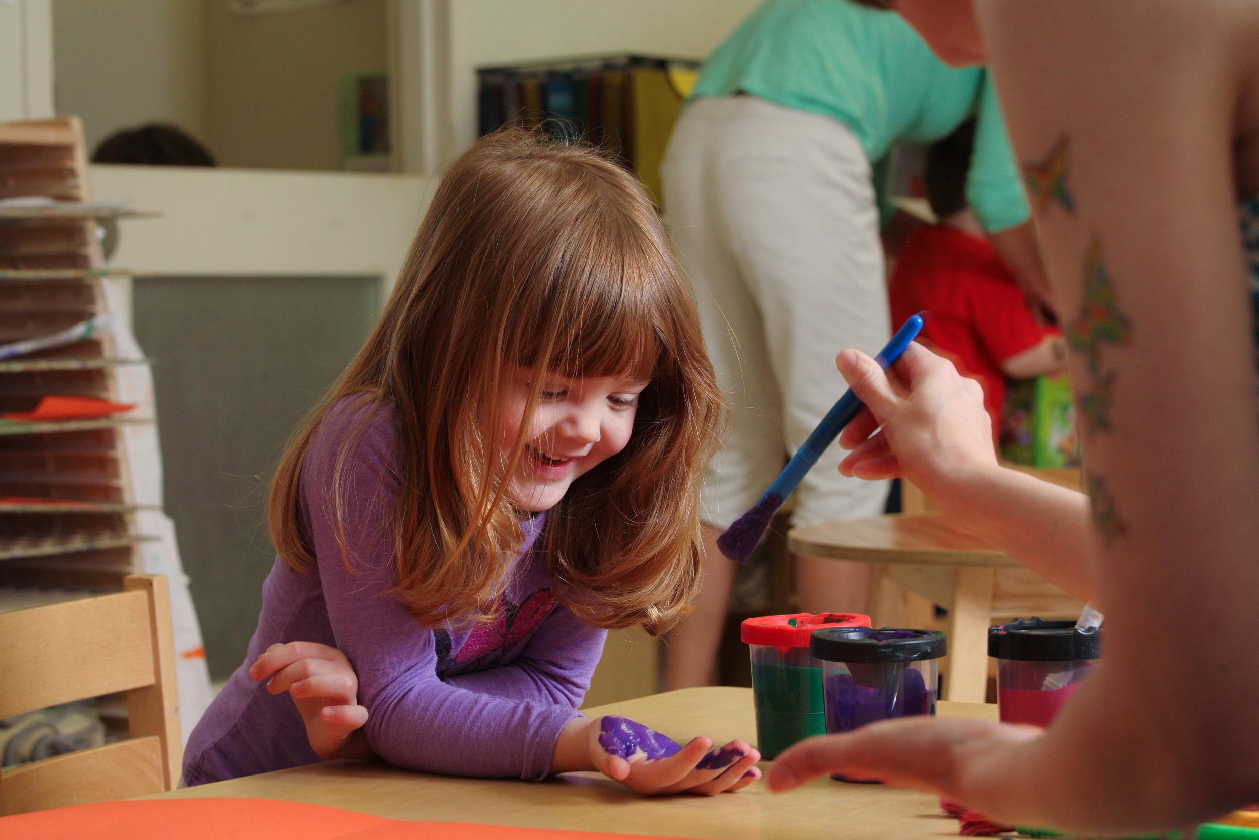 A child using paint